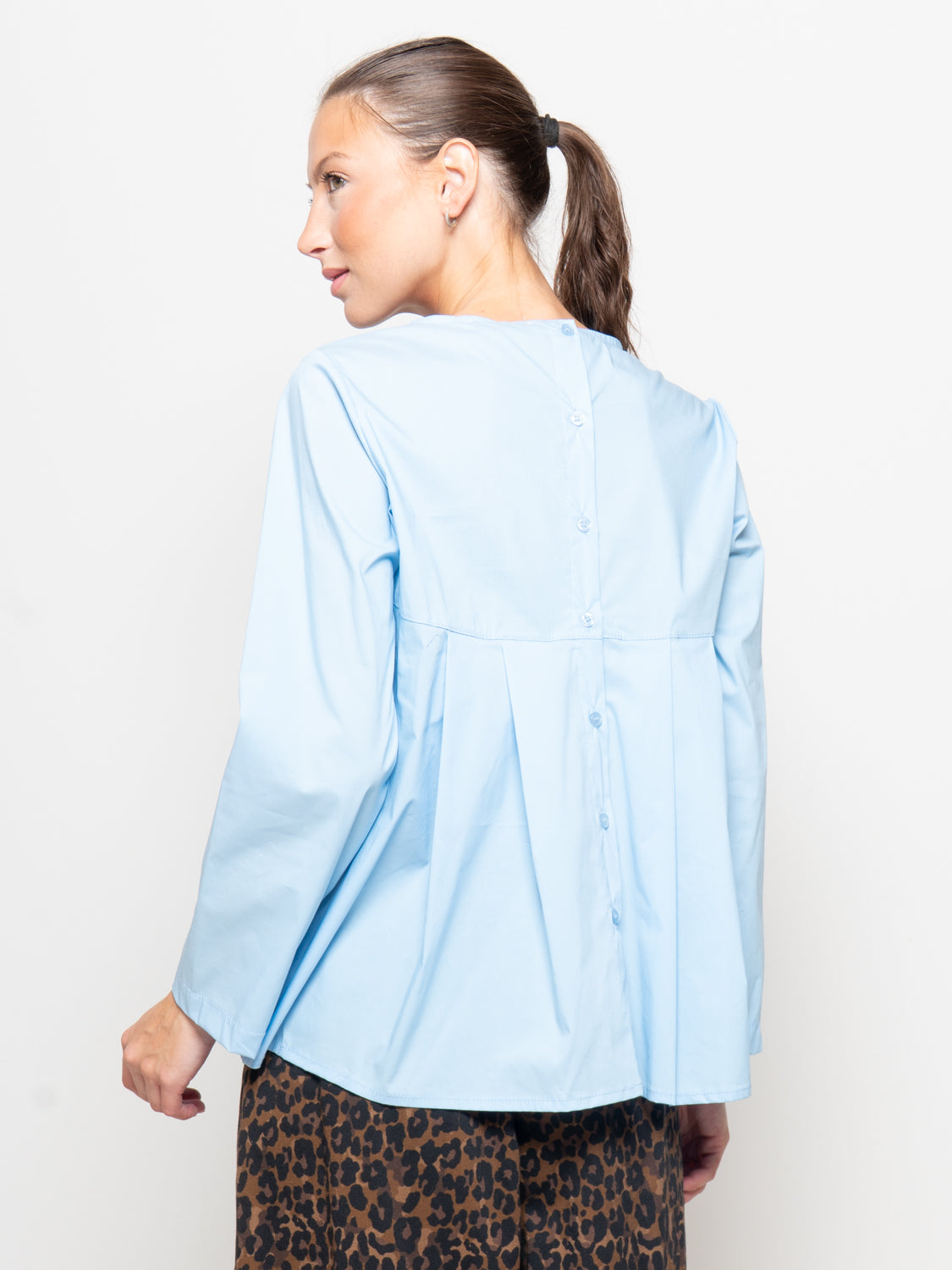 Blusa con pieghe