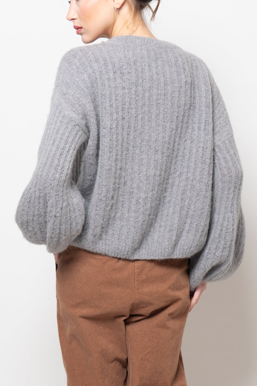 Maglia a coste con manica volume