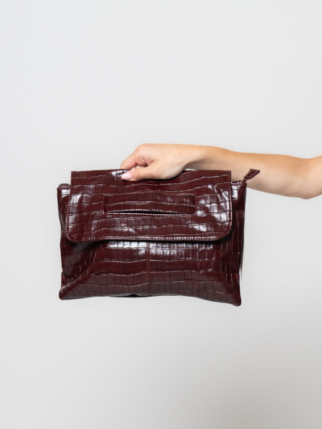 Pochette effetto coccodrillo in similpelle