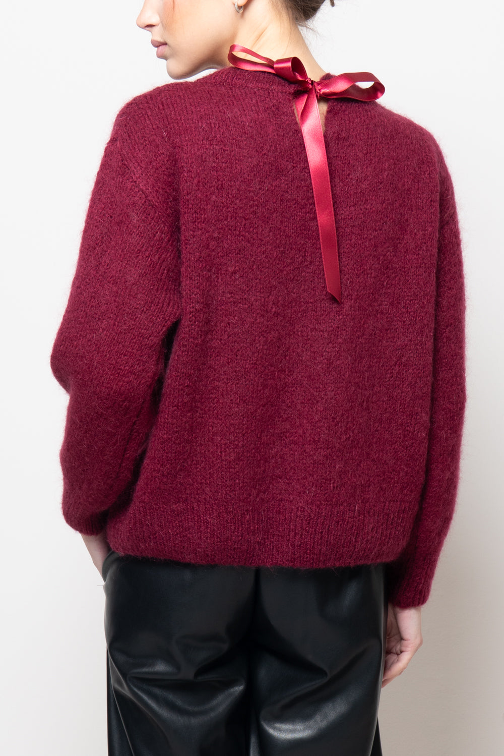 Maglia con fiocco dietro