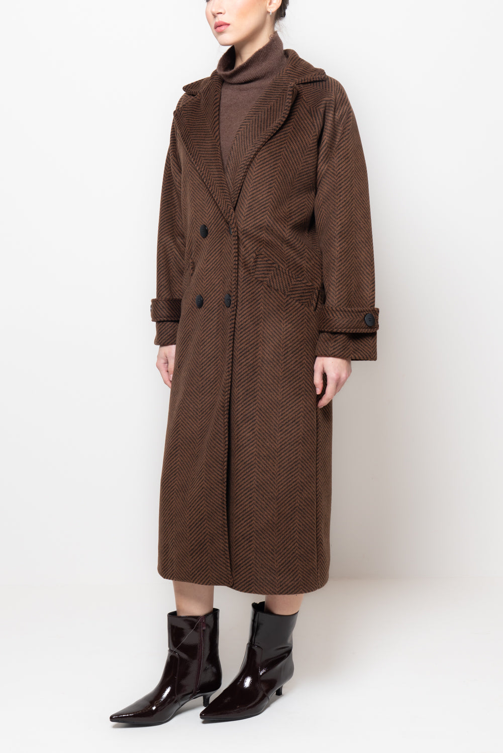 Cappotto doppio petto in fantasia spigata