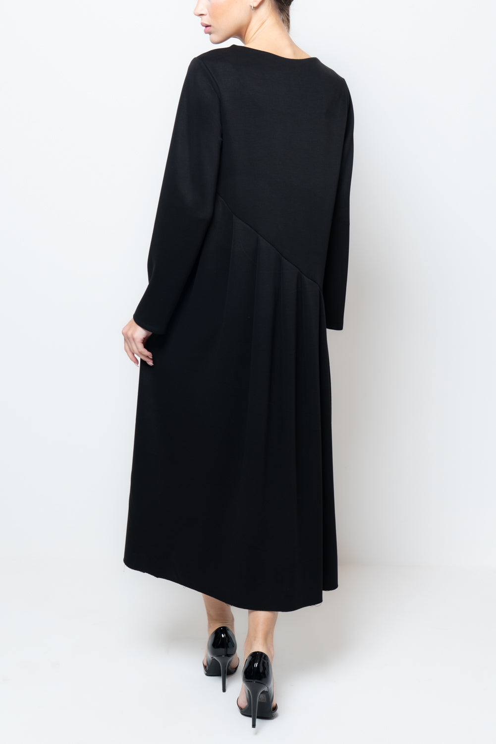 Abito ampio a pieghe