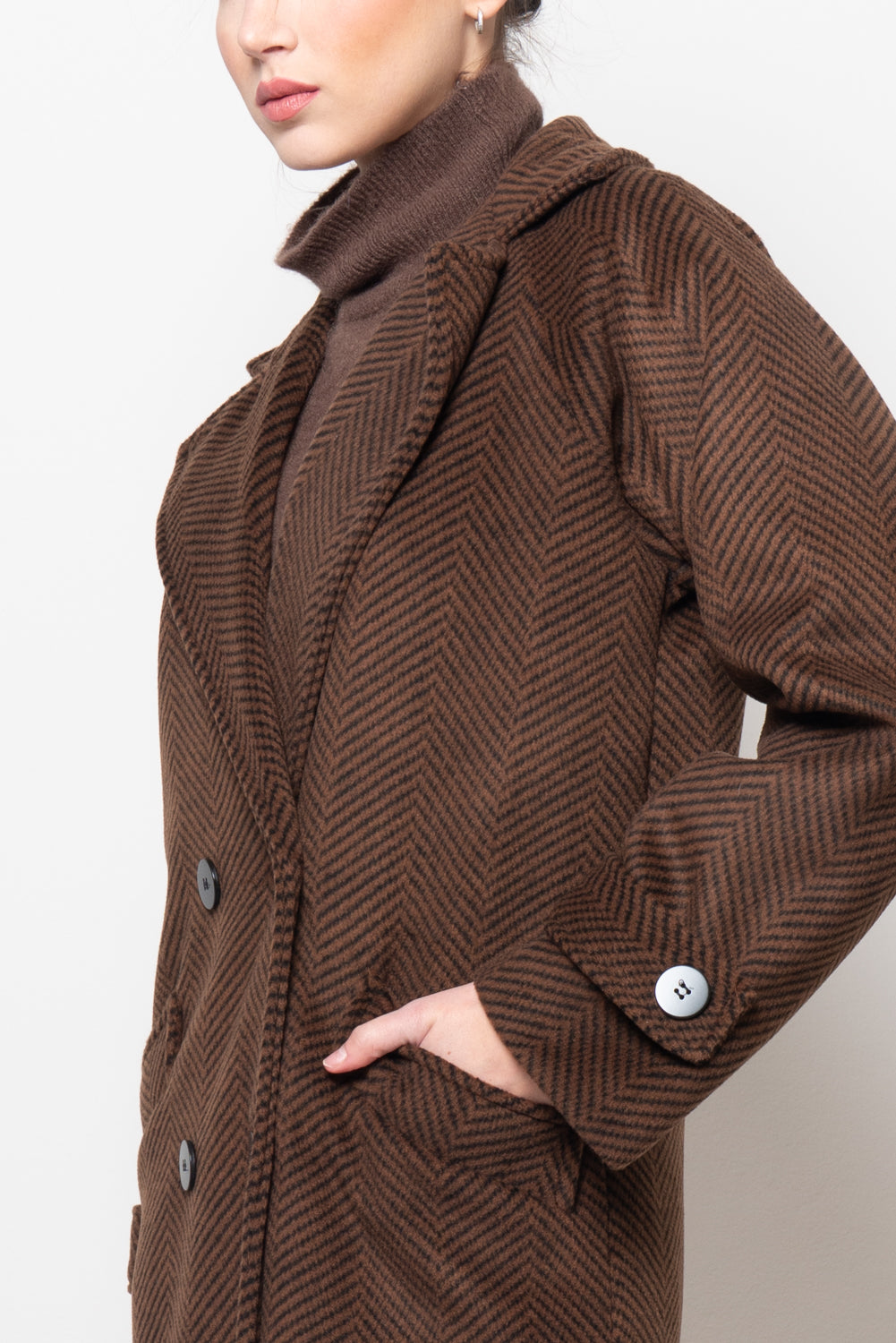 Cappotto doppio petto in fantasia spigata