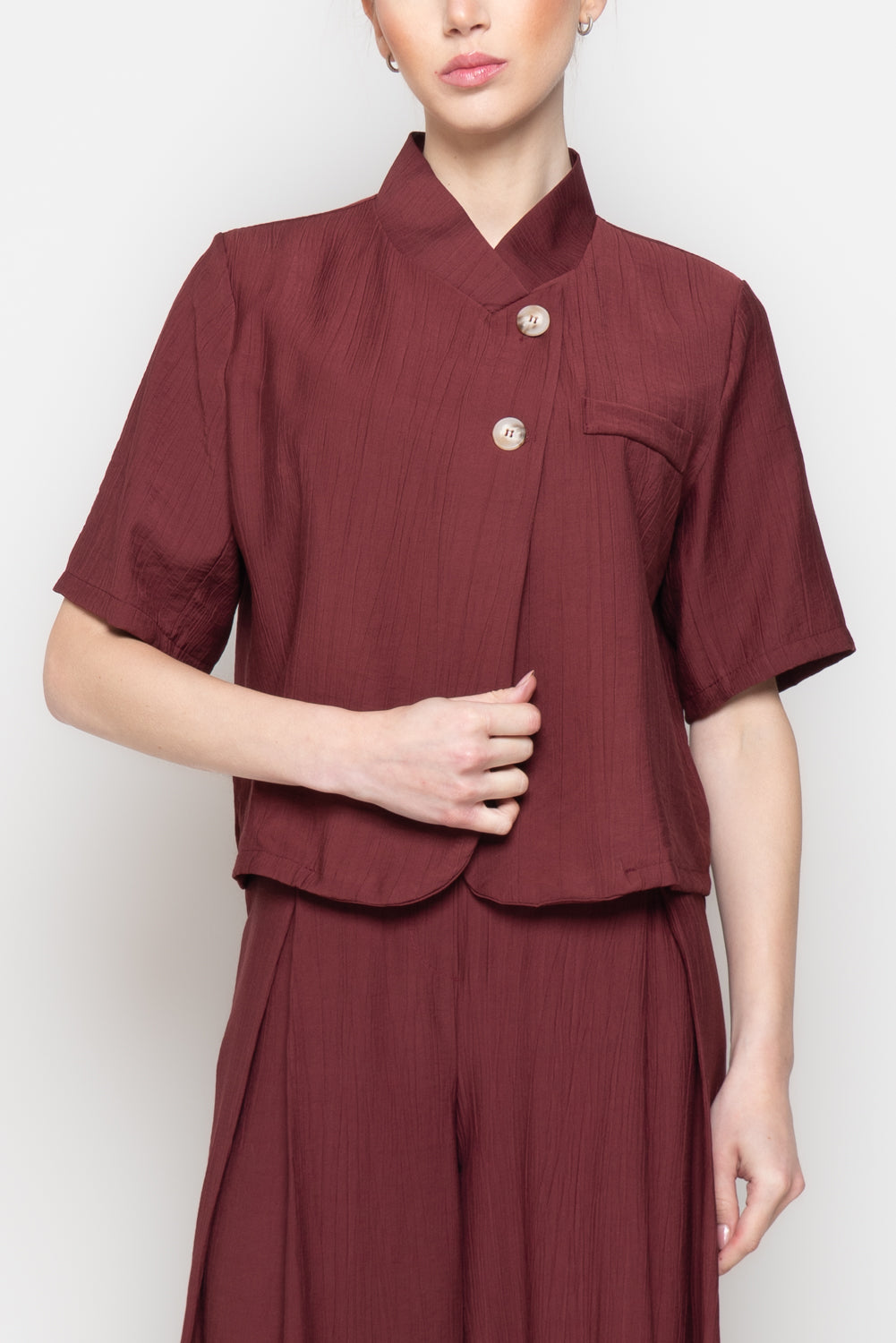 Blusa a mezze maniche con scollo incrociato