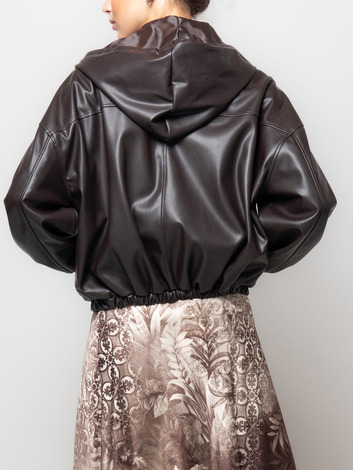 Bomber effetto pelle con cappuccio