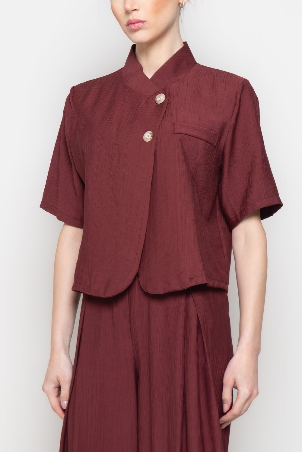 Blusa a mezze maniche con scollo incrociato