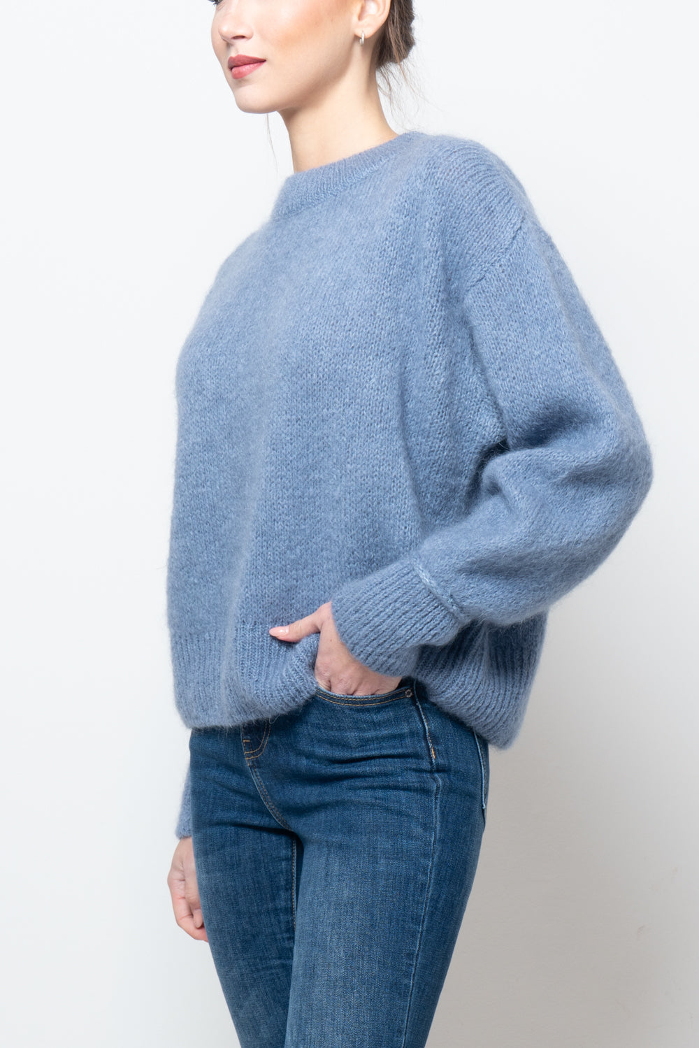 Maglia con pailettes sul polsino