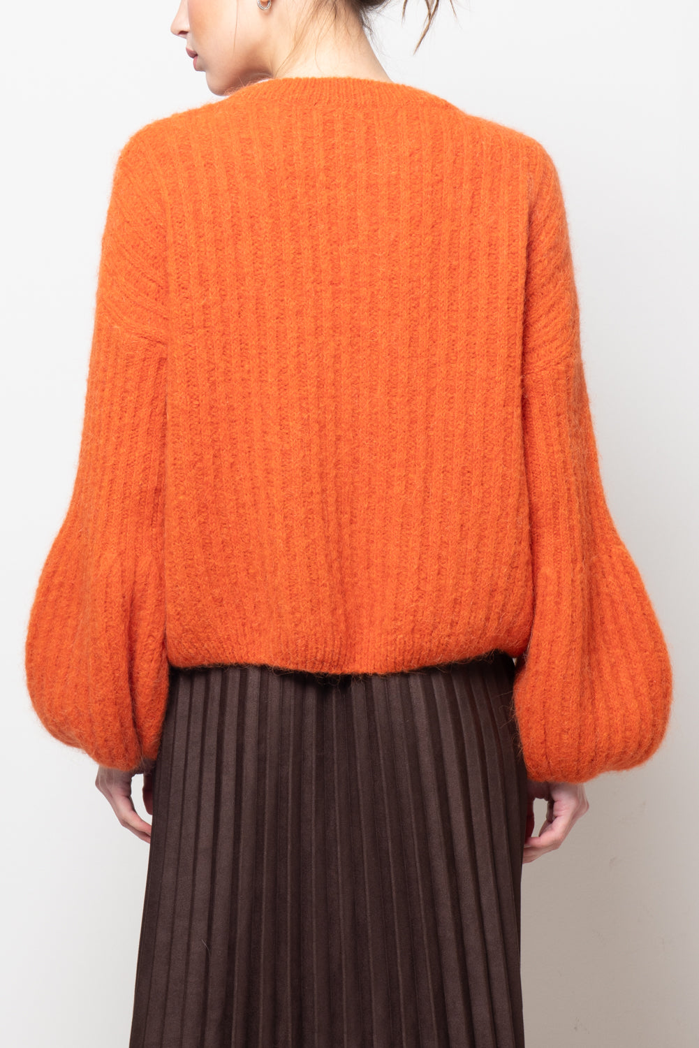 Maglia a coste con manica volume