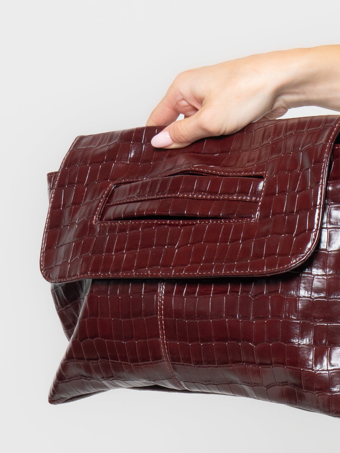 Pochette effetto coccodrillo in similpelle