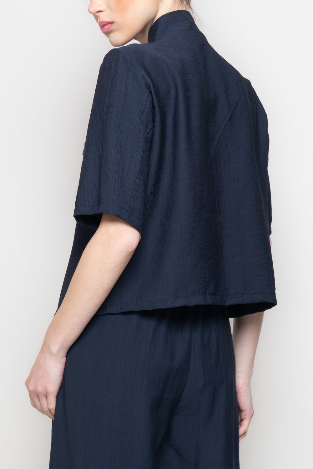 Blusa a mezze maniche con scollo incrociato
