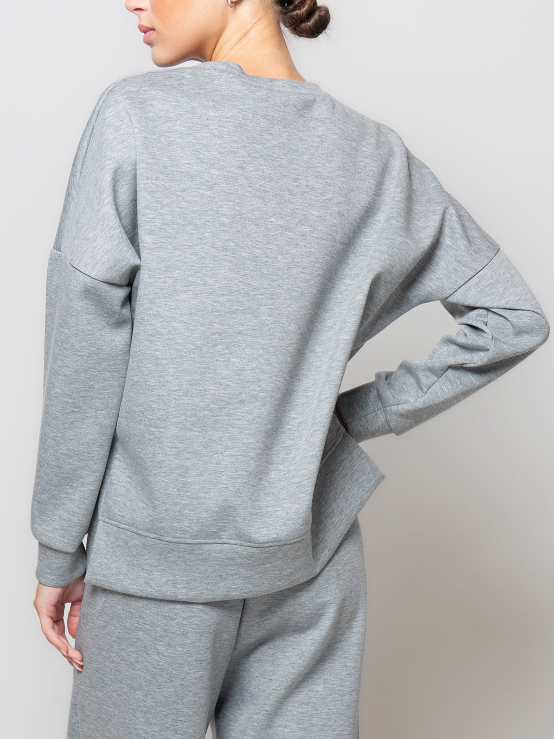 Felpa in neoprene con spacchi laterali