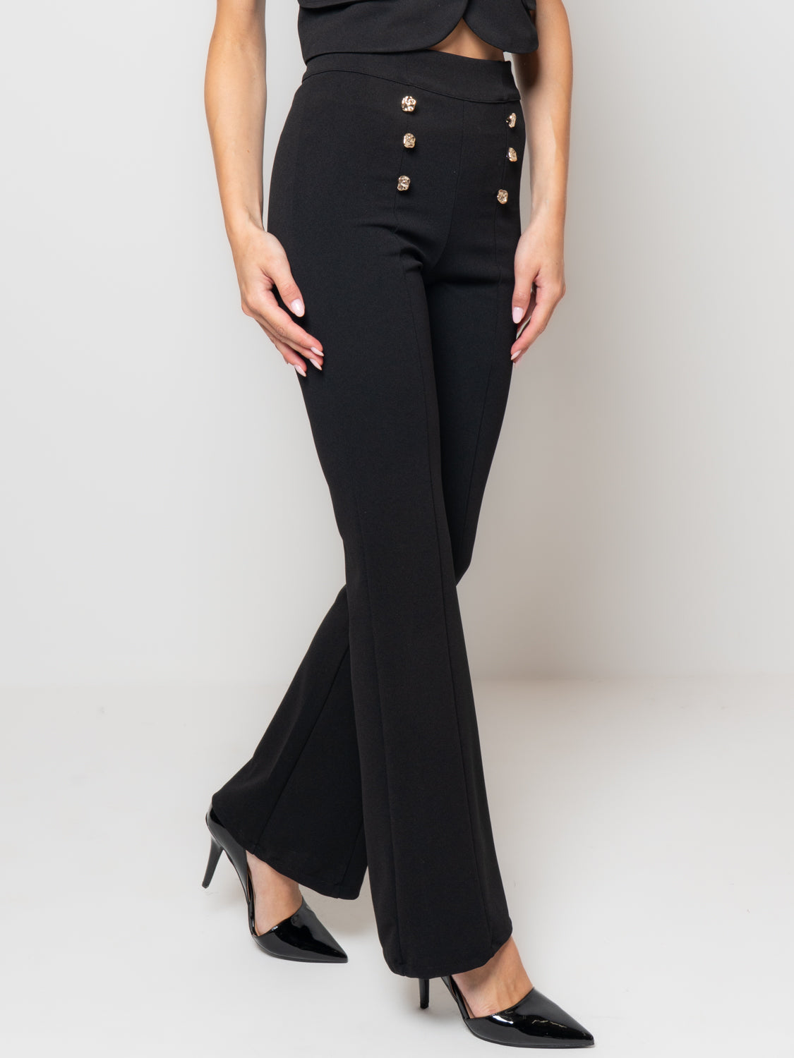 Pantalone a zampa con bottoni gioiello
