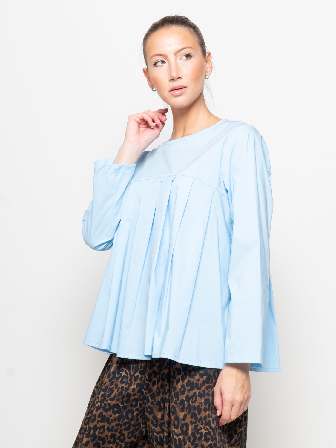 Blusa con pieghe