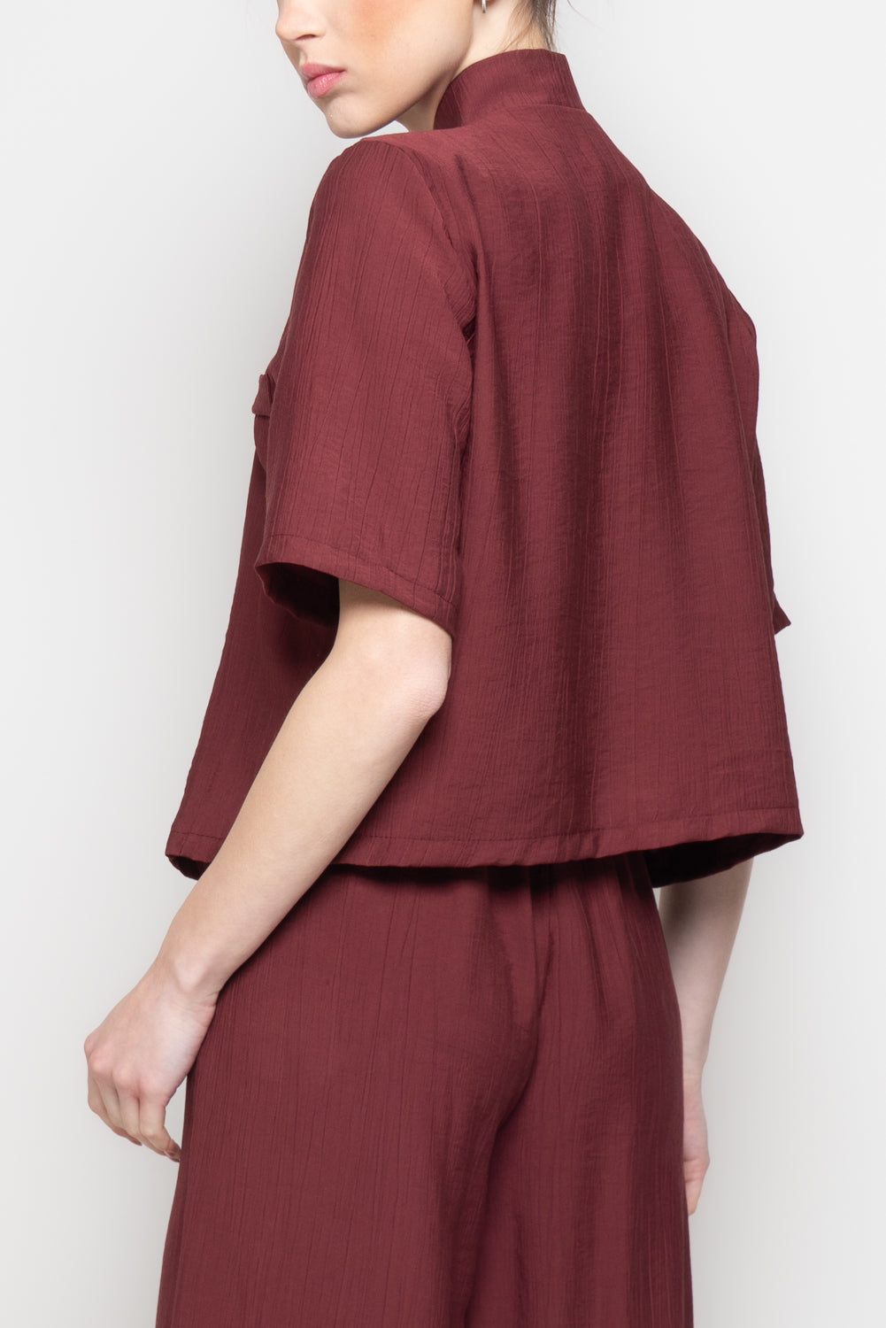 Blusa a mezze maniche con scollo incrociato