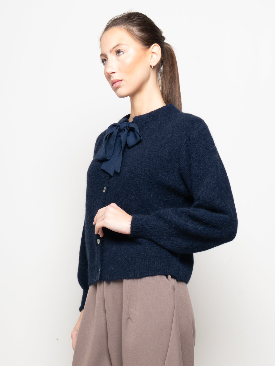 Cardigan in maglia con fiocco