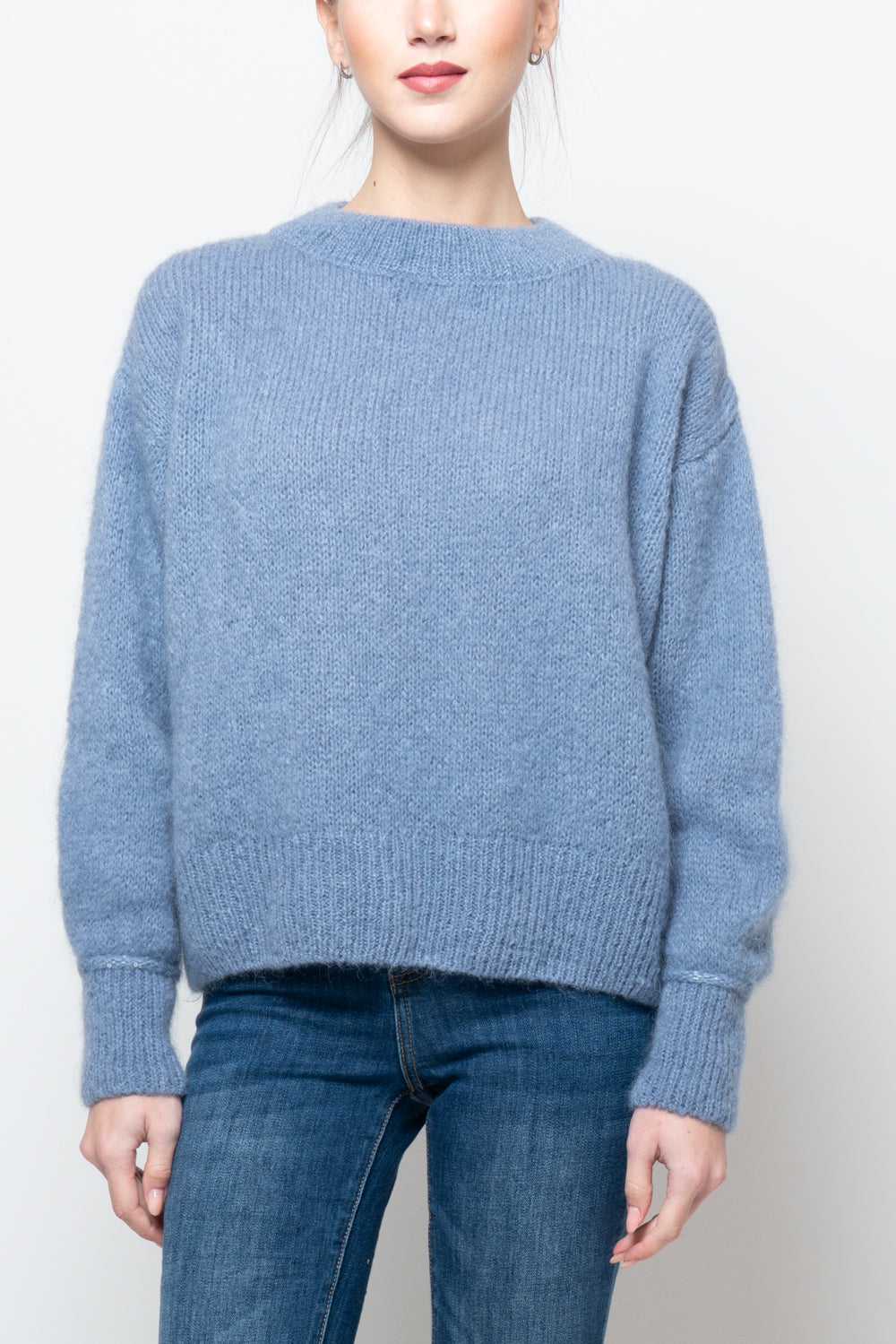 Maglia con pailettes sul polsino