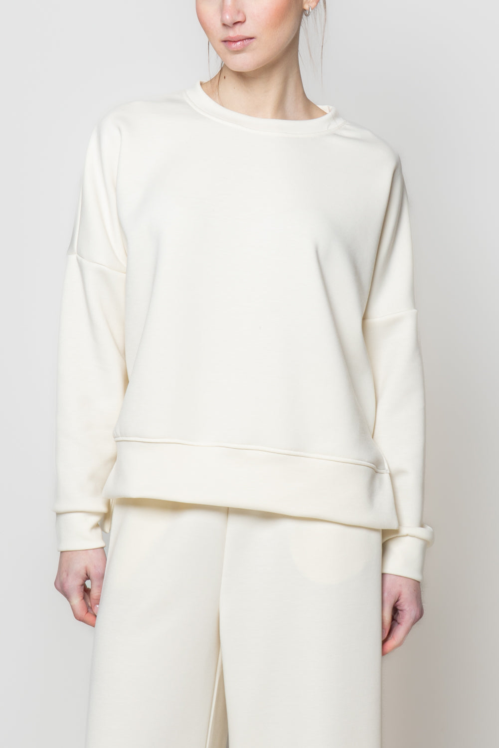 Felpa in neoprene con spacchi laterali