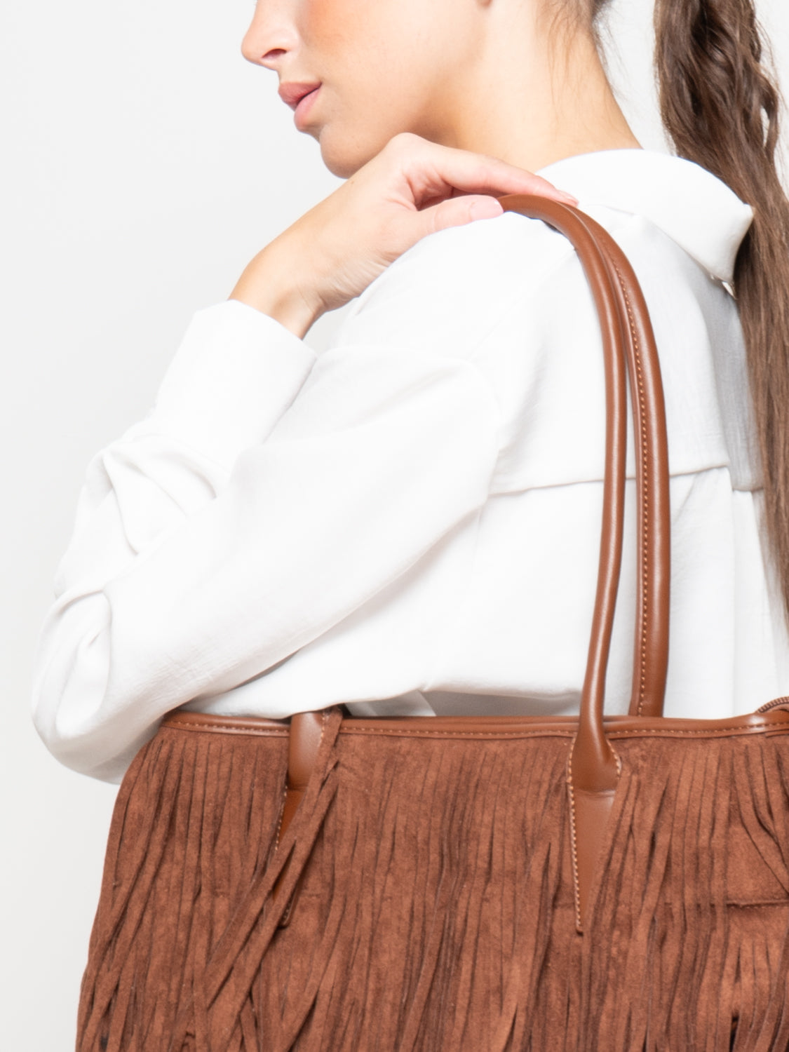 Borsa a bauletto con frange