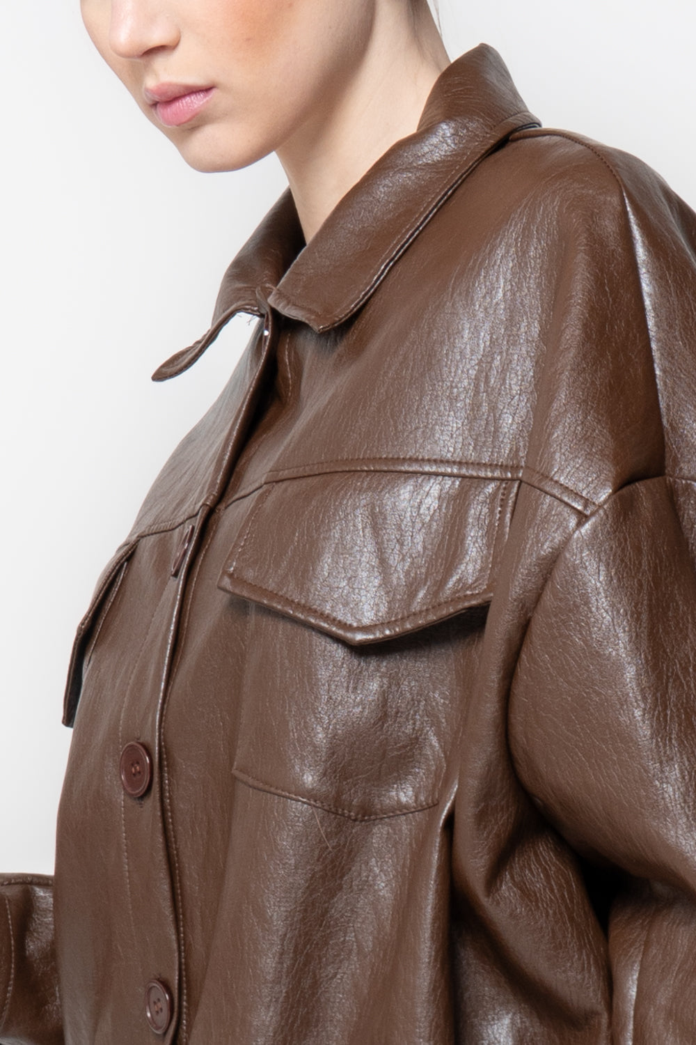 Bomber in similpelle con tasche frontali