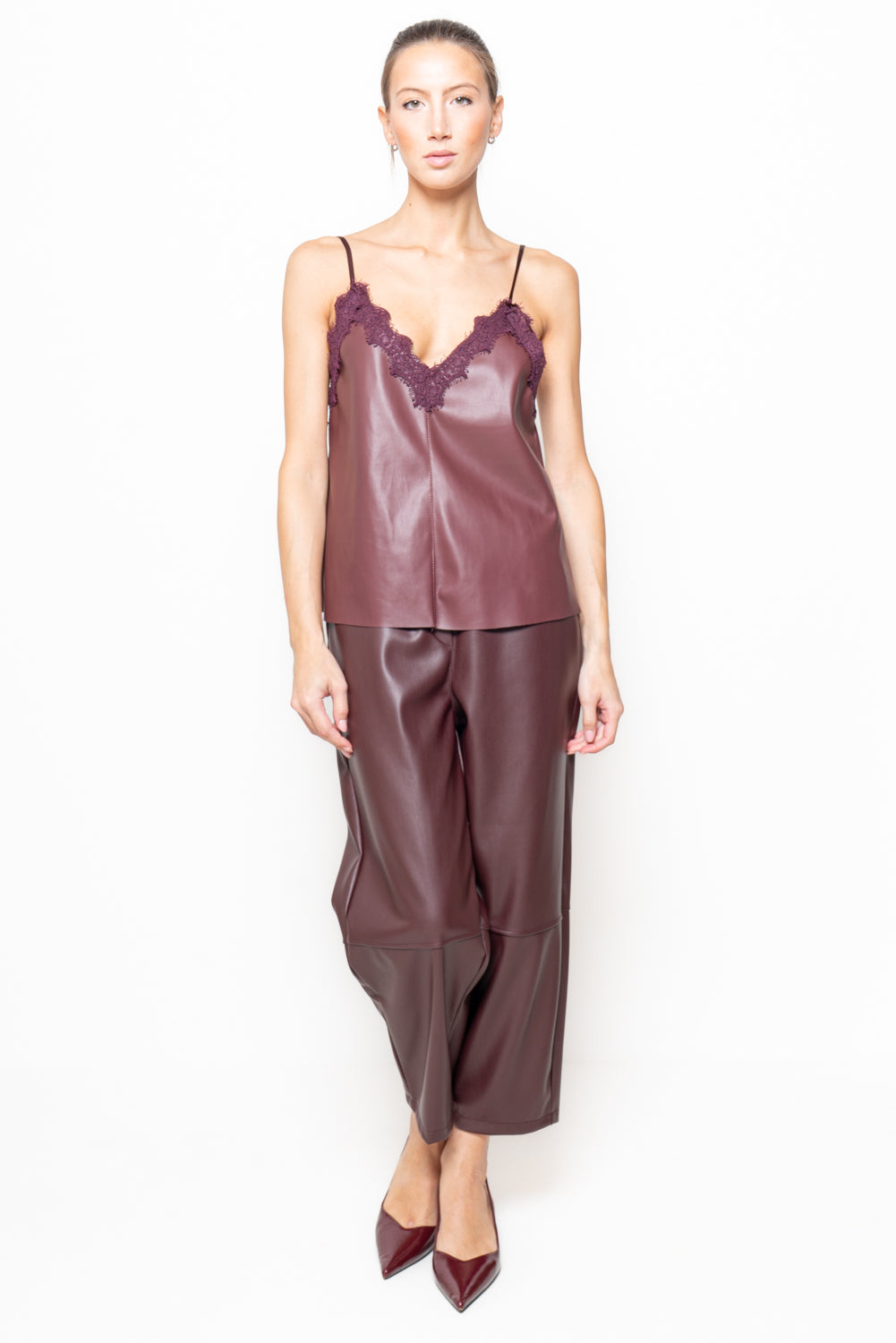 Top in ecopelle con pizzo