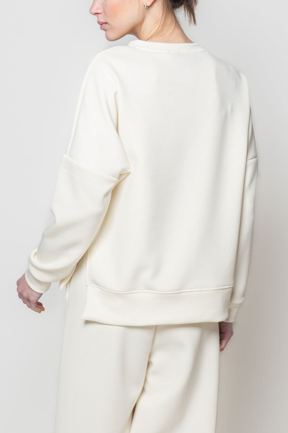 Felpa in neoprene con spacchi laterali