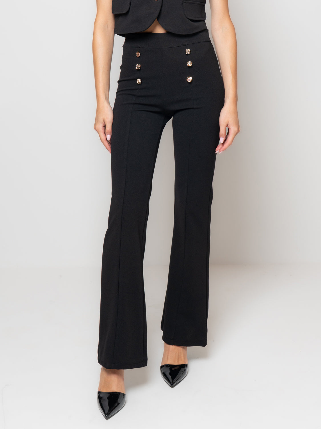 Pantalone a zampa con bottoni gioiello