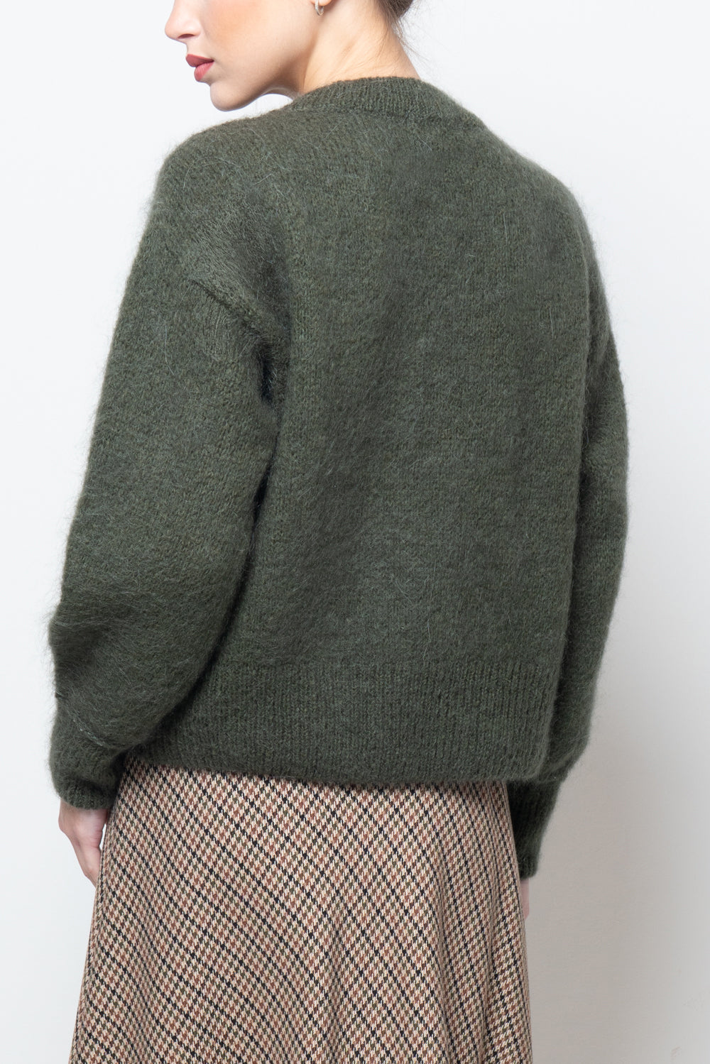 Maglia con pailettes sul polsino