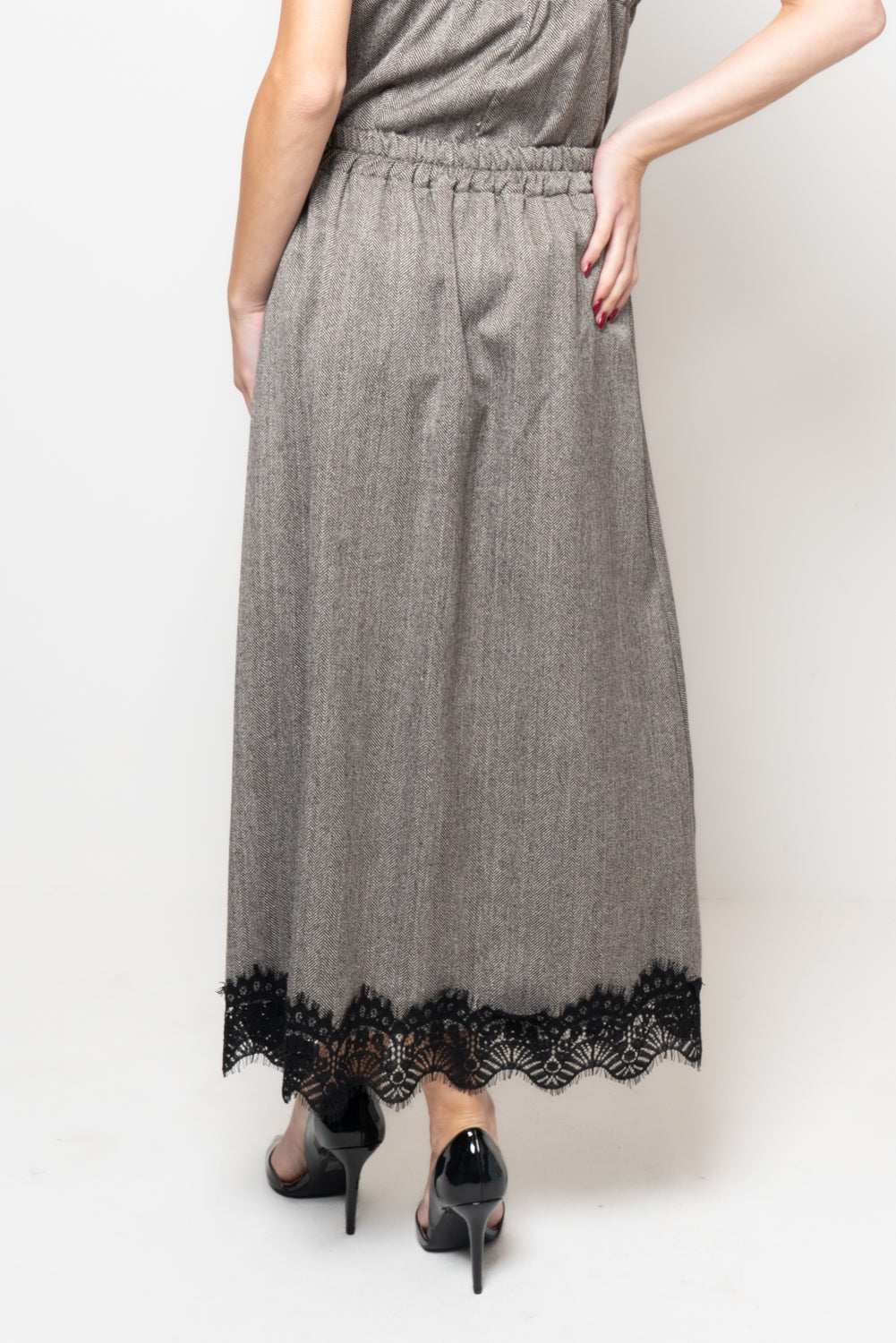 Gonna in tessuto spigato con profilo in pizzo