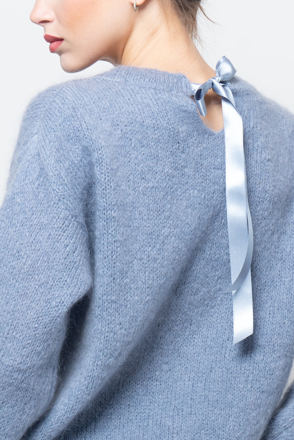 Maglia con fiocco dietro