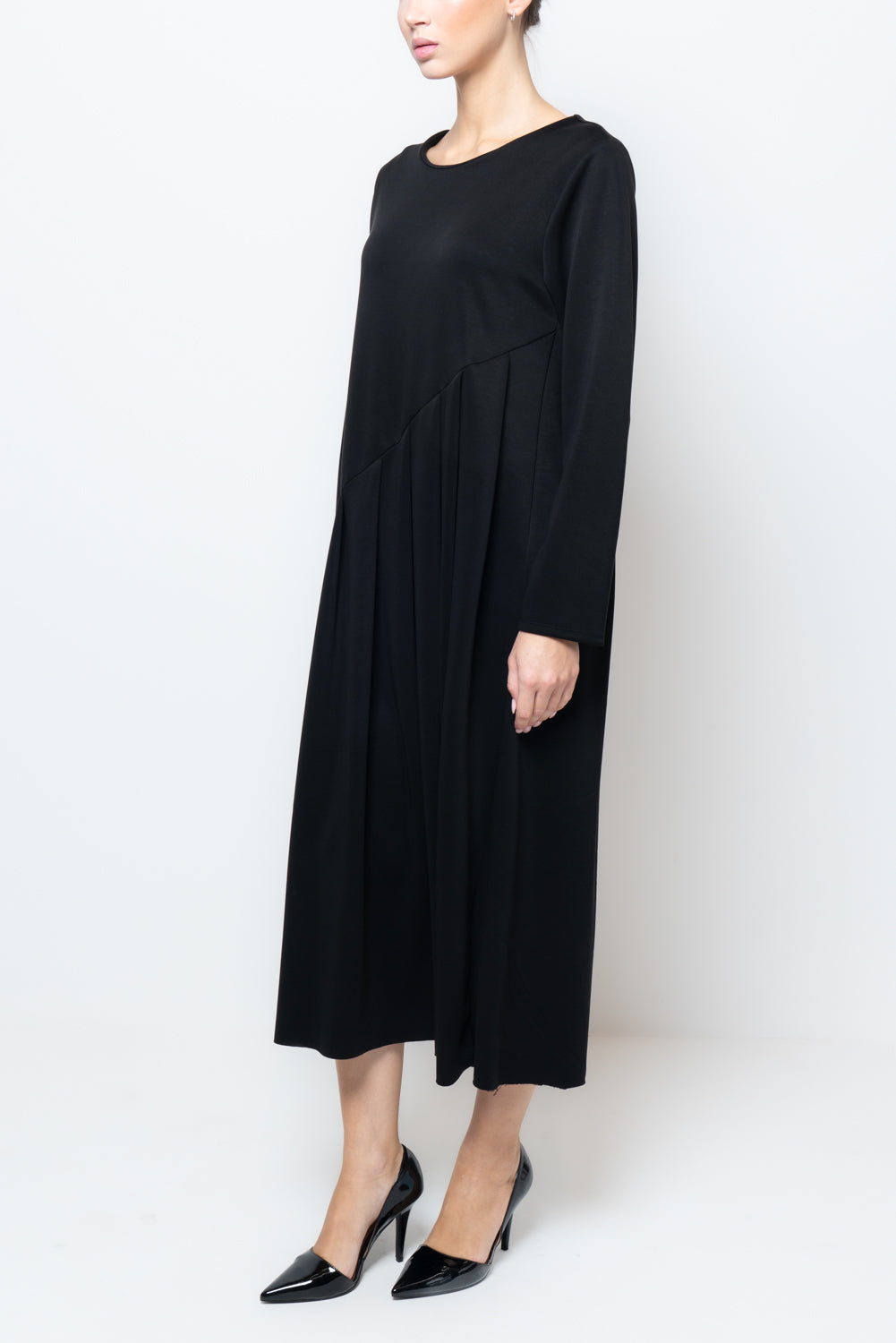 Abito ampio a pieghe