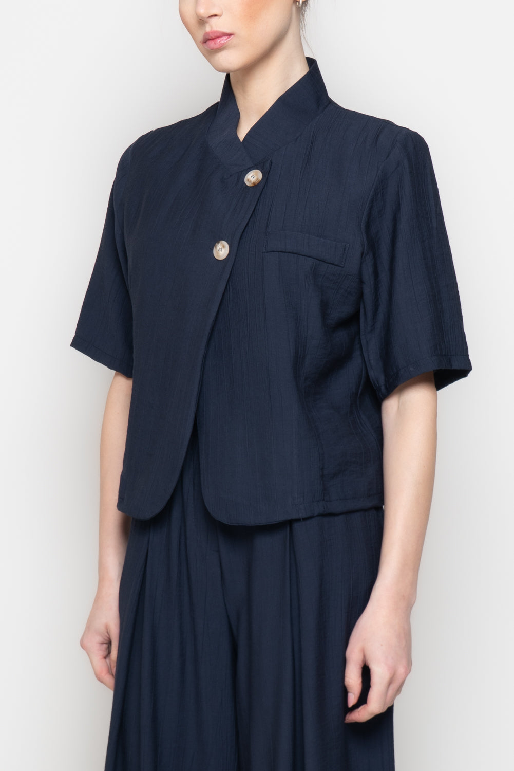 Blusa a mezze maniche con scollo incrociato