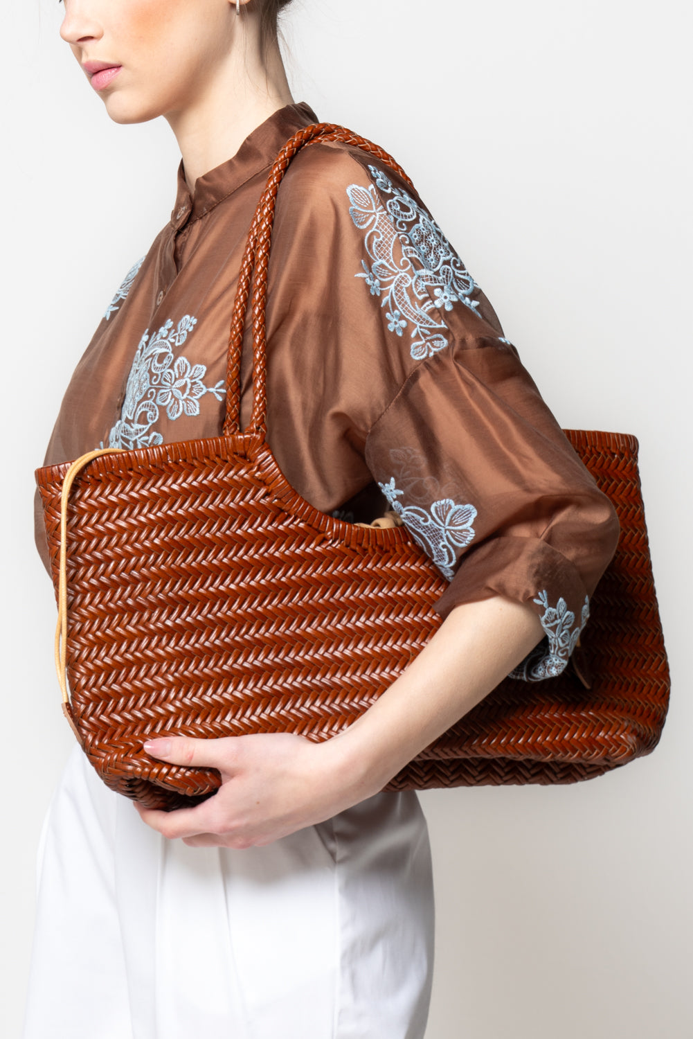 Borsa intrecciata in pelle