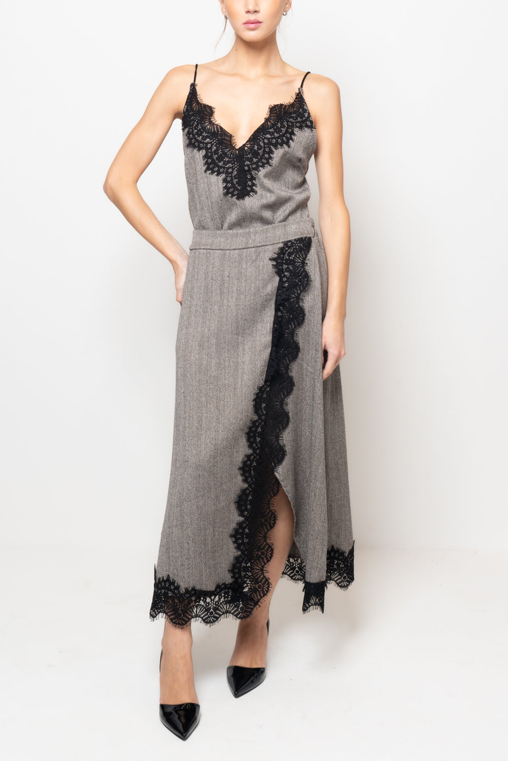 Gonna in tessuto spigato con profilo in pizzo