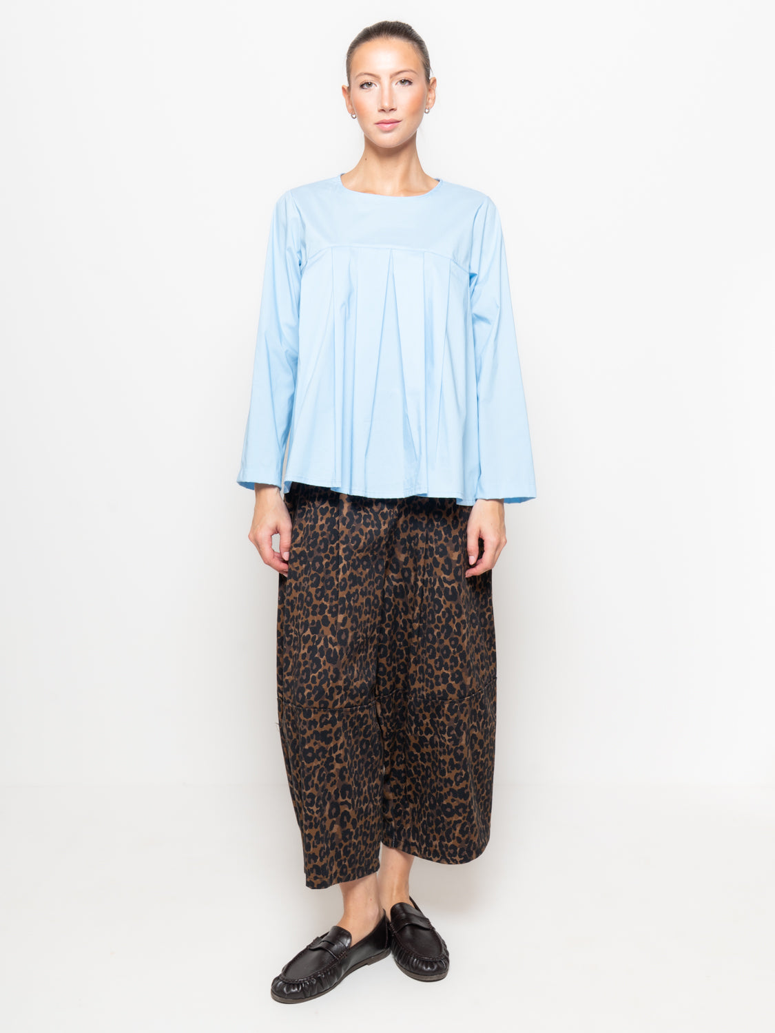 Blusa con pieghe