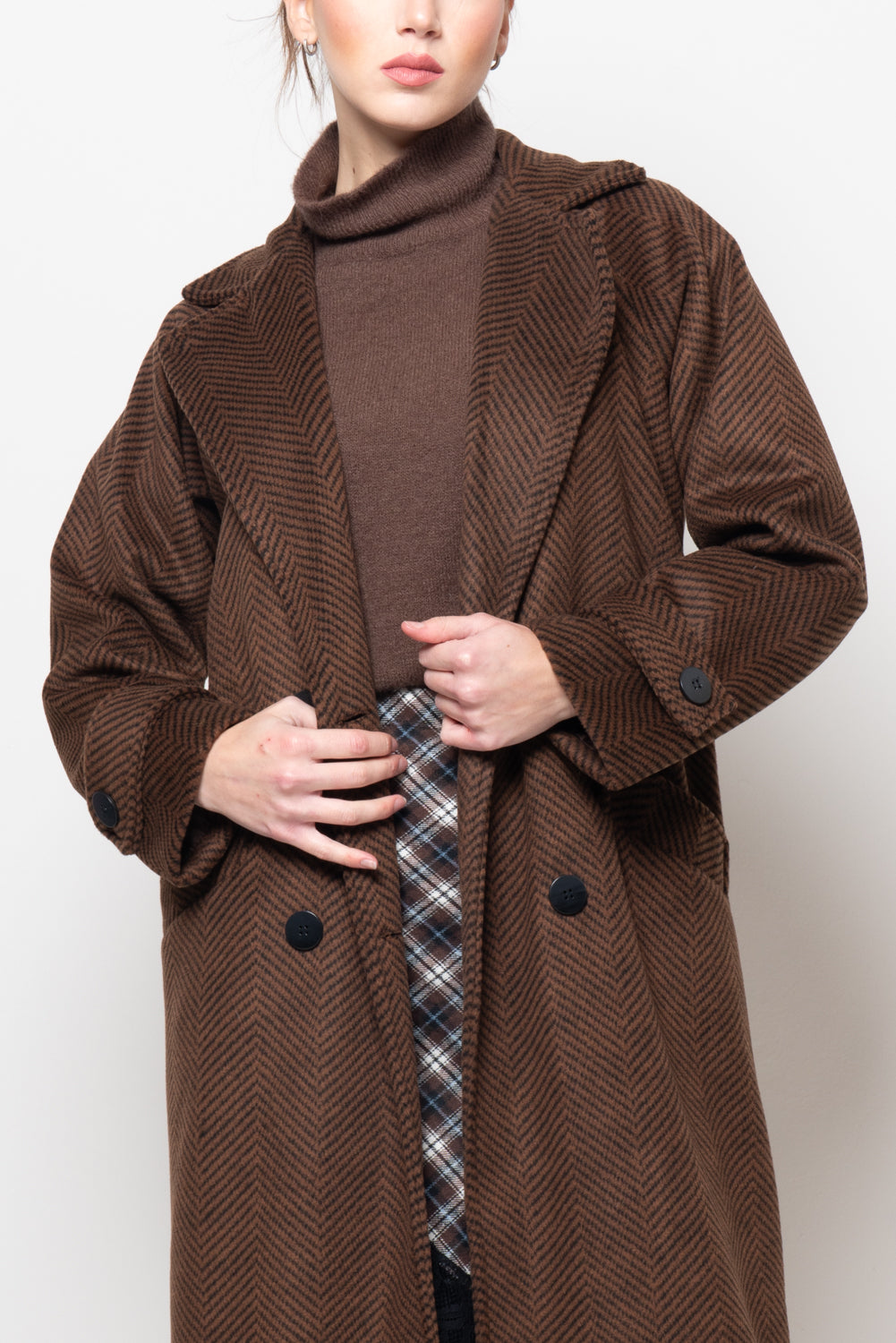 Cappotto doppio petto in fantasia spigata