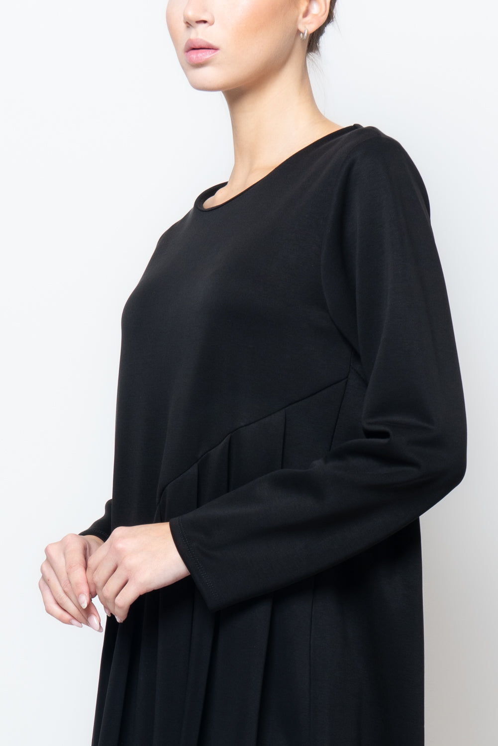 Abito ampio a pieghe