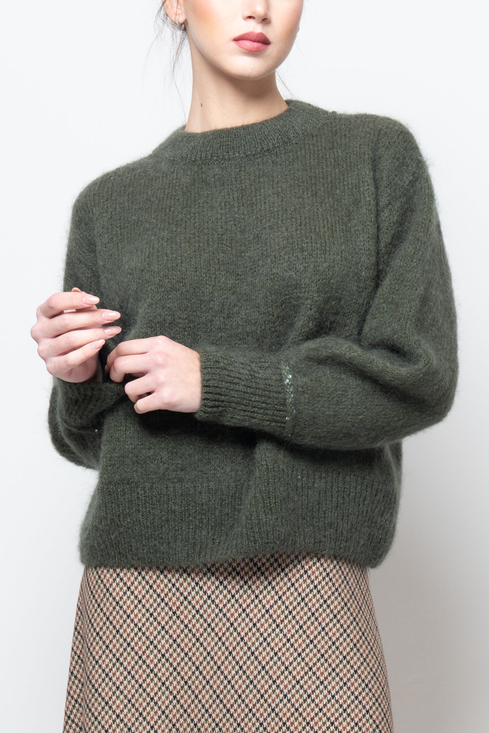 Maglia con pailettes sul polsino