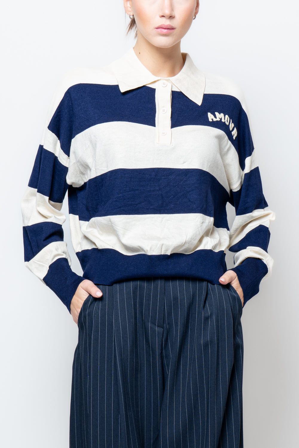 Maglia con colletto a righe