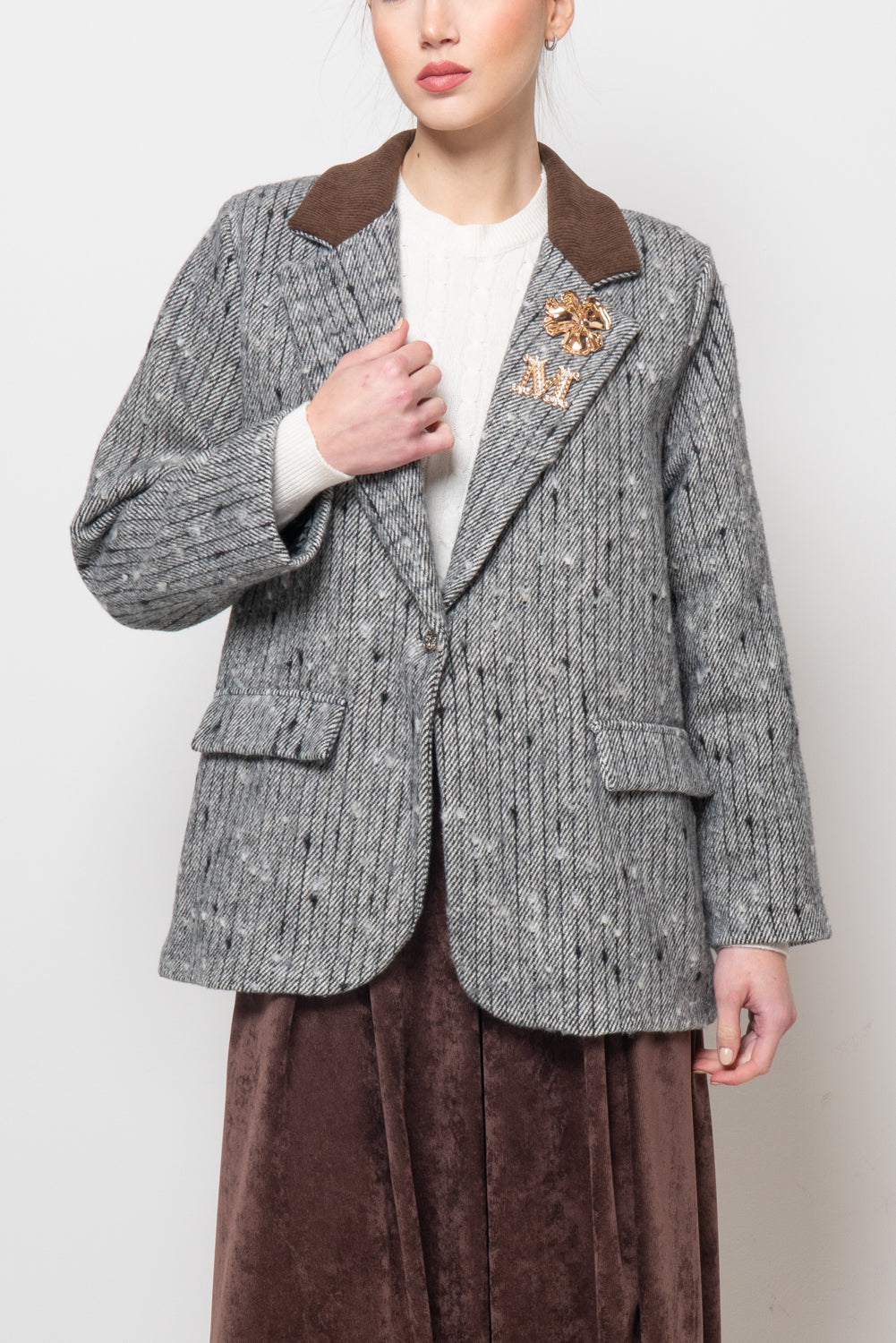 Giacca spigata con colletto in velluto