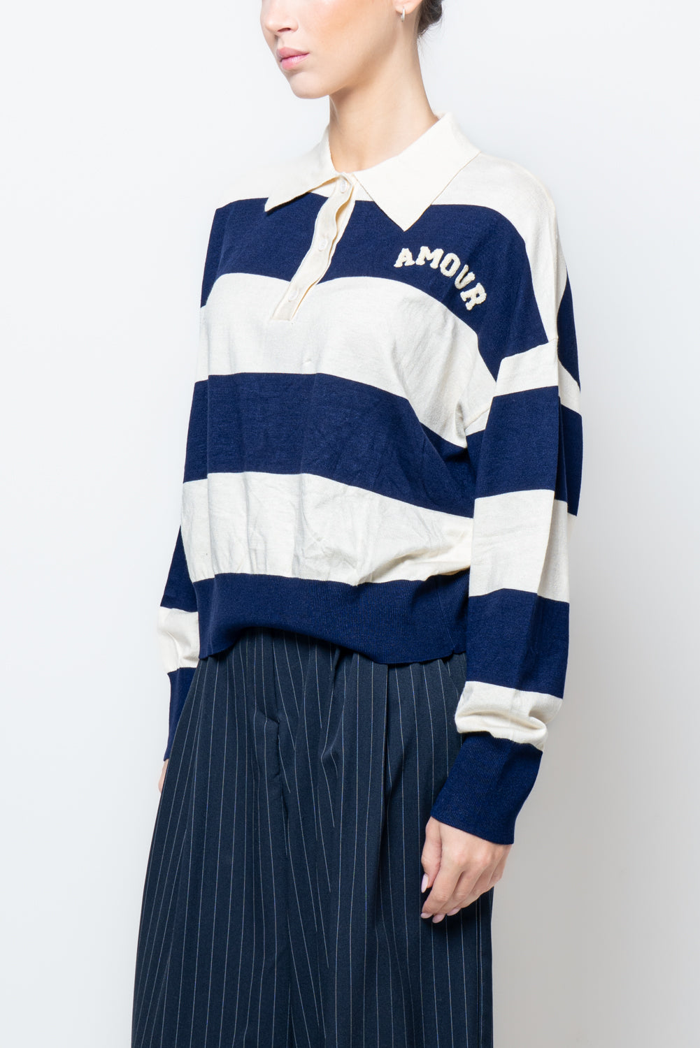 Maglia con colletto a righe