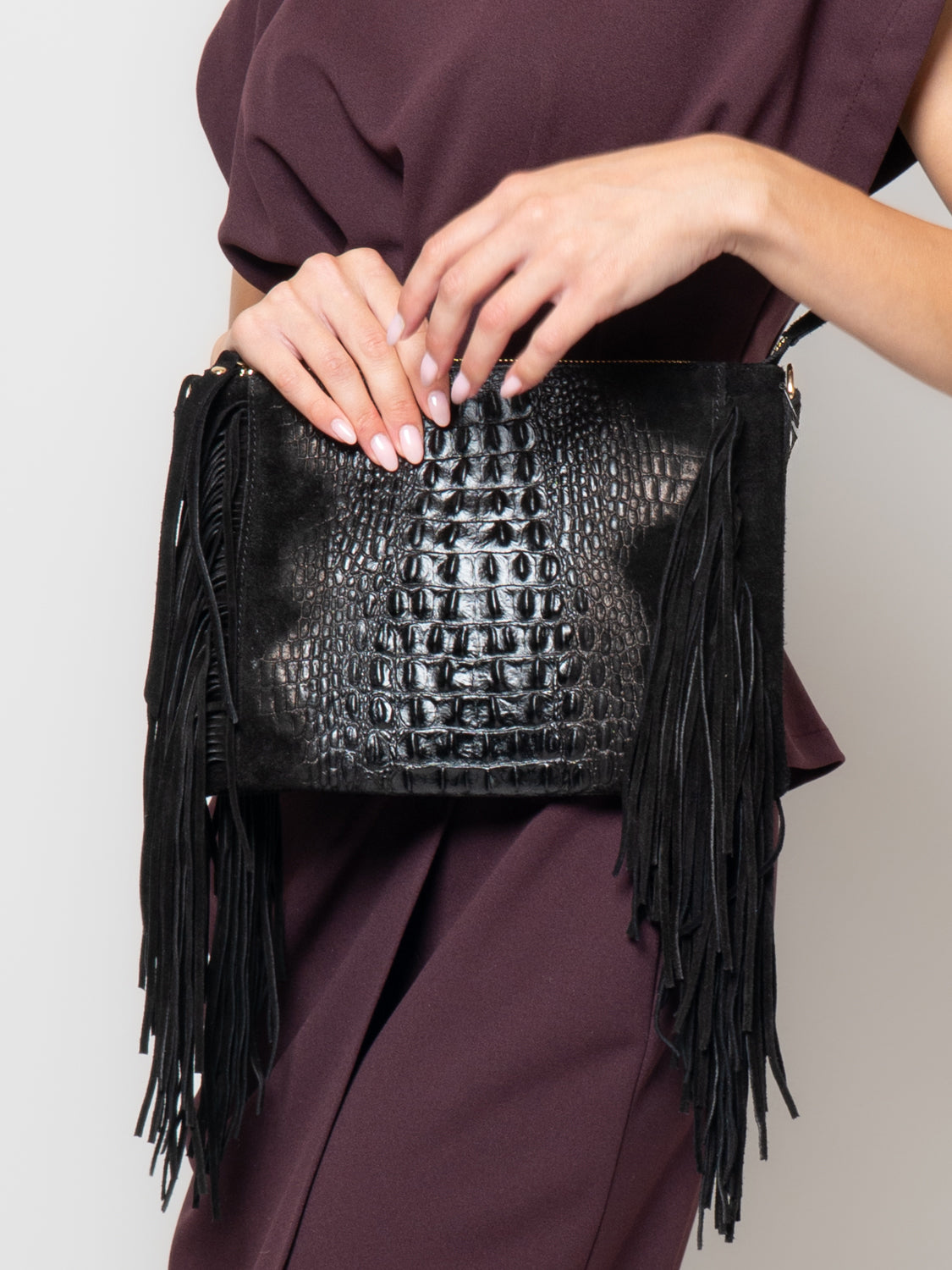 Pochette in pelle effetto coccodrillo con frange