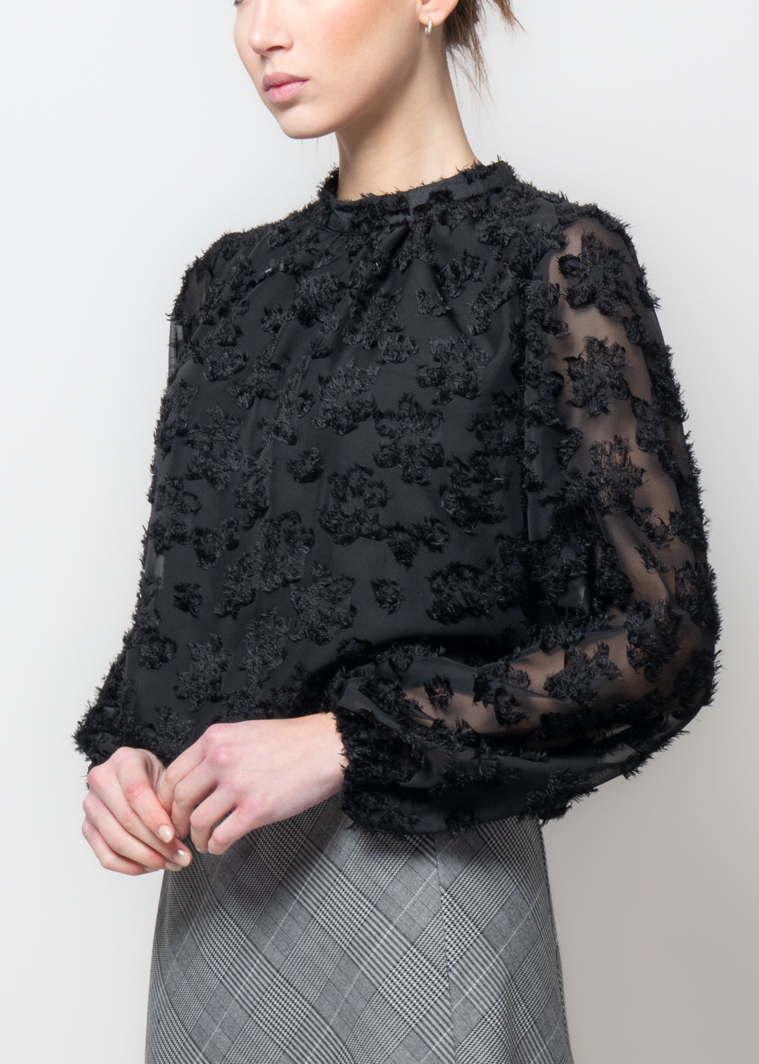 Blusa in tessuto ricamato