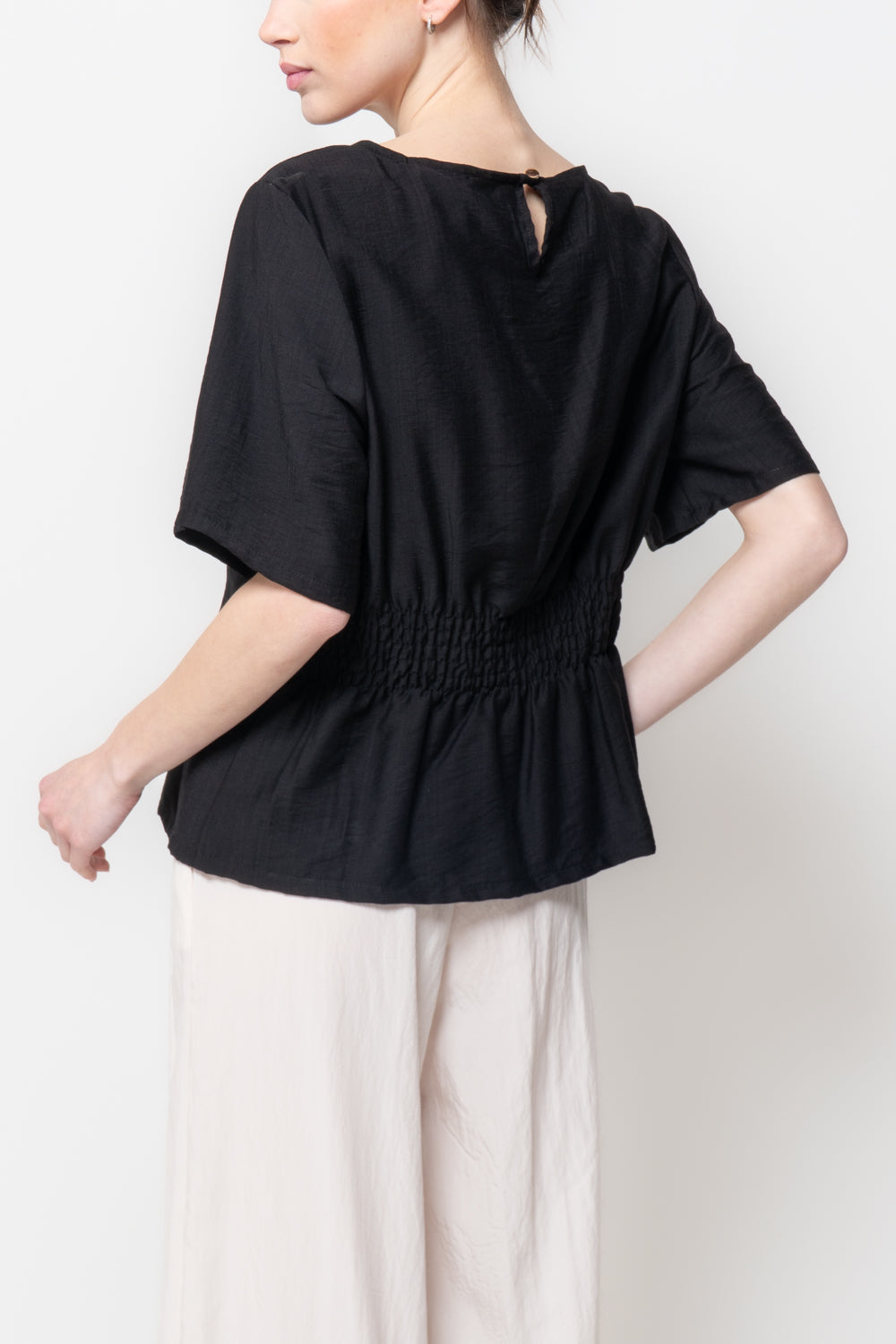 Blusa con Arricciatura Posteriore