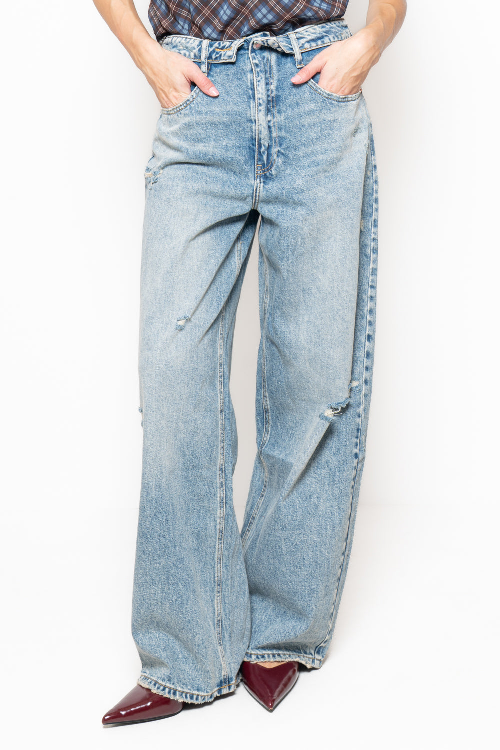 Jeans wideleg destroyed vita alta con risvolto