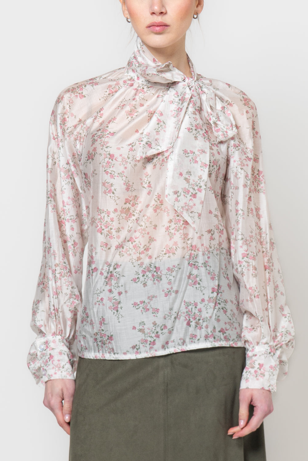 Blusa con fiocco in fantasia floreale