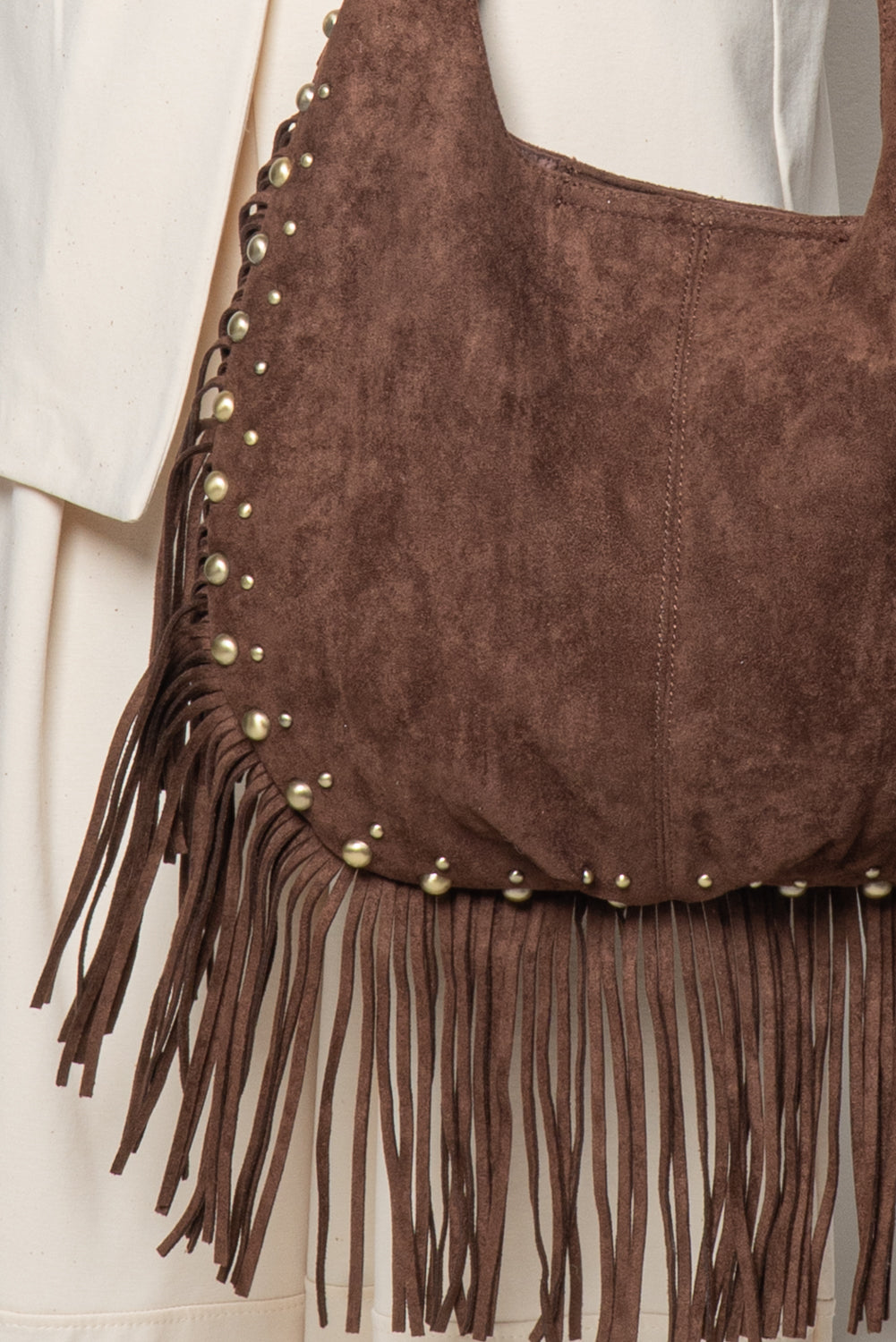 Borsa con frange e borchie