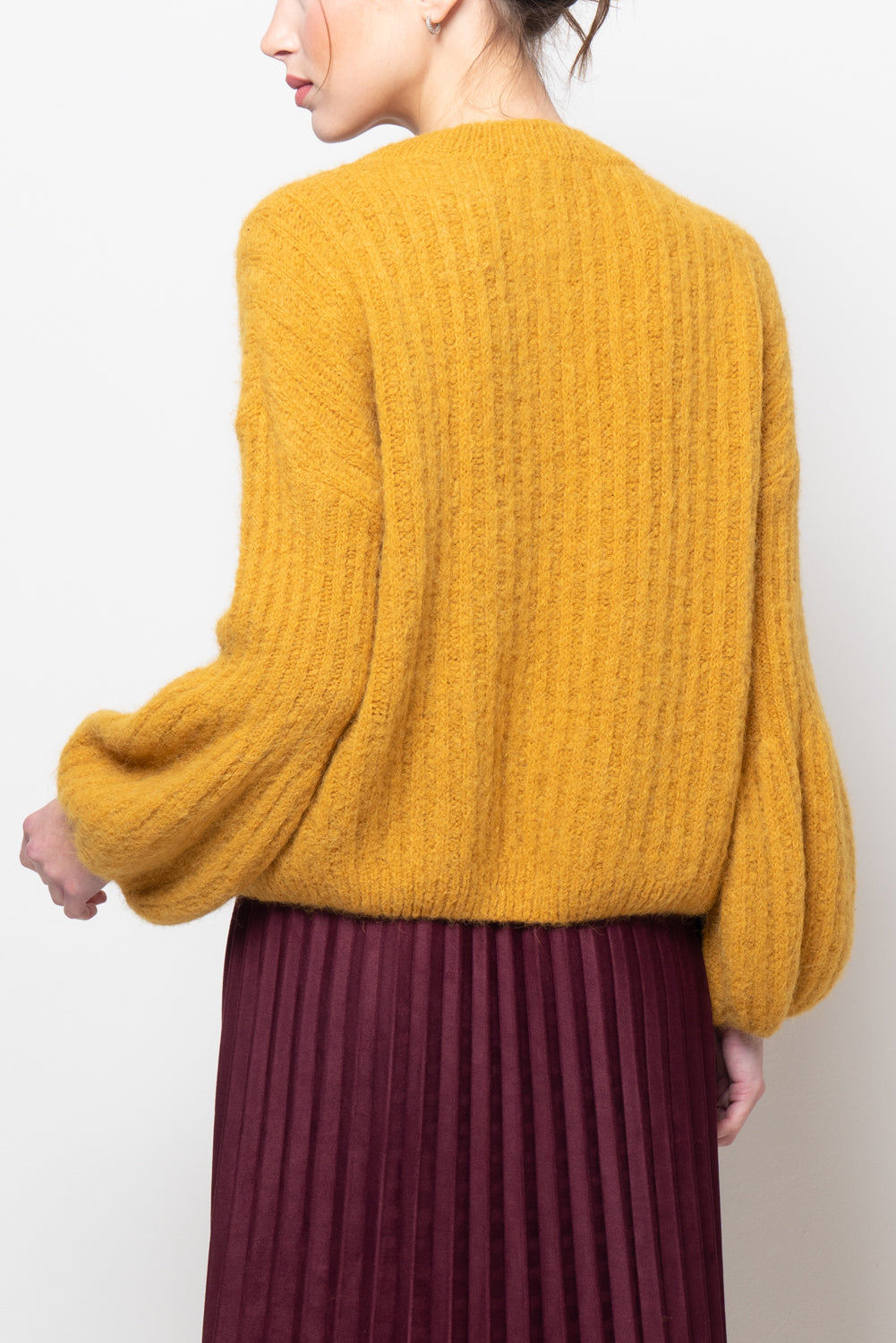 Maglia a coste con manica volume