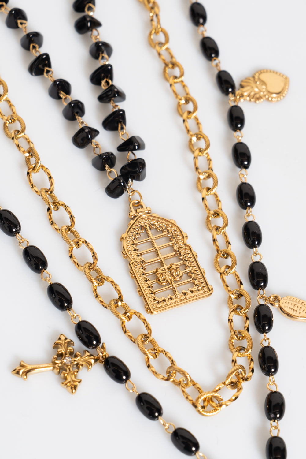 Collana multi filo con croce