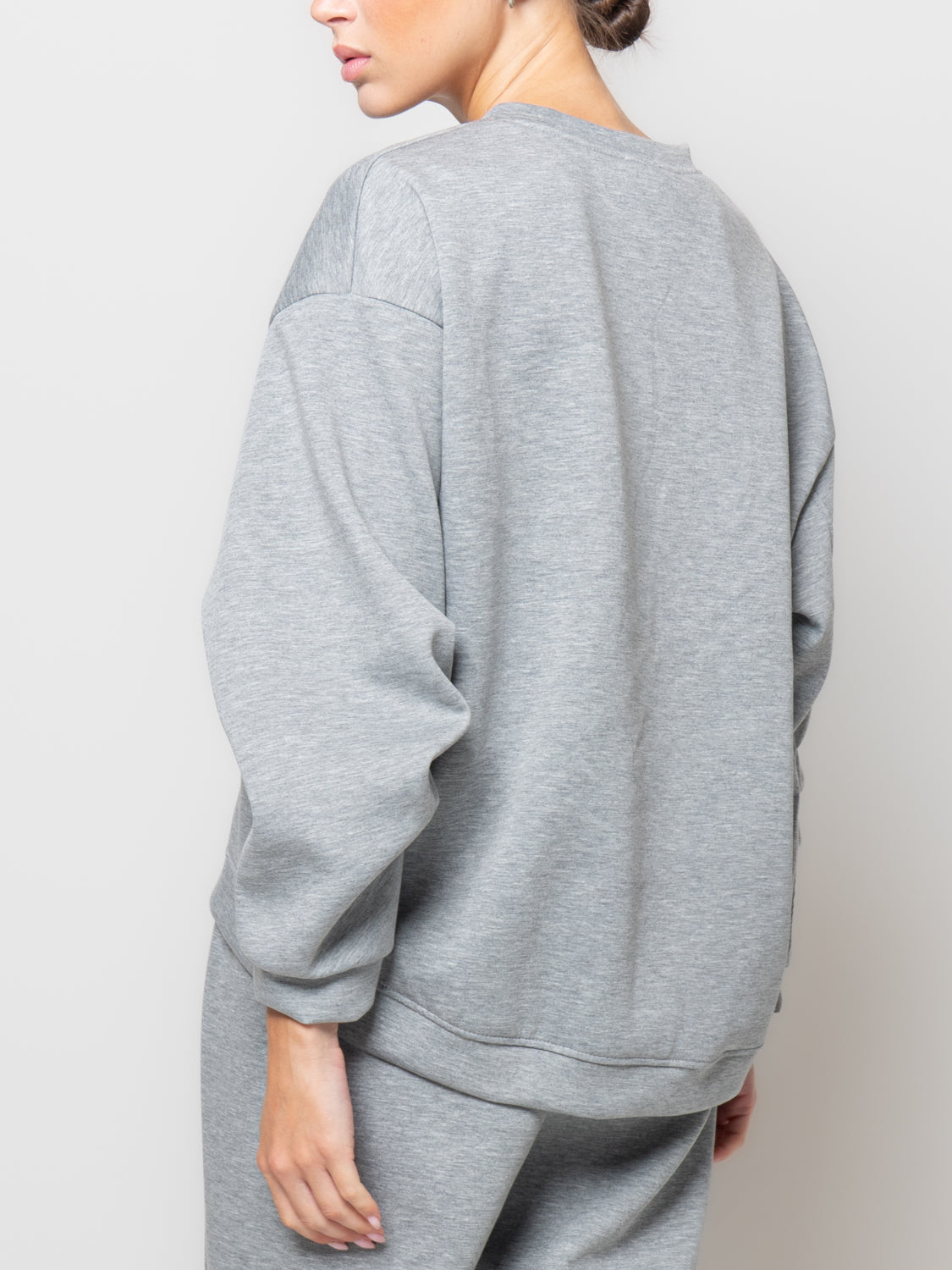 Felpa in neoprene con manica rappresa