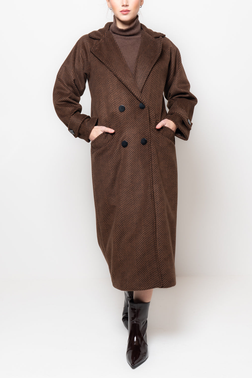 Cappotto doppio petto in fantasia spigata